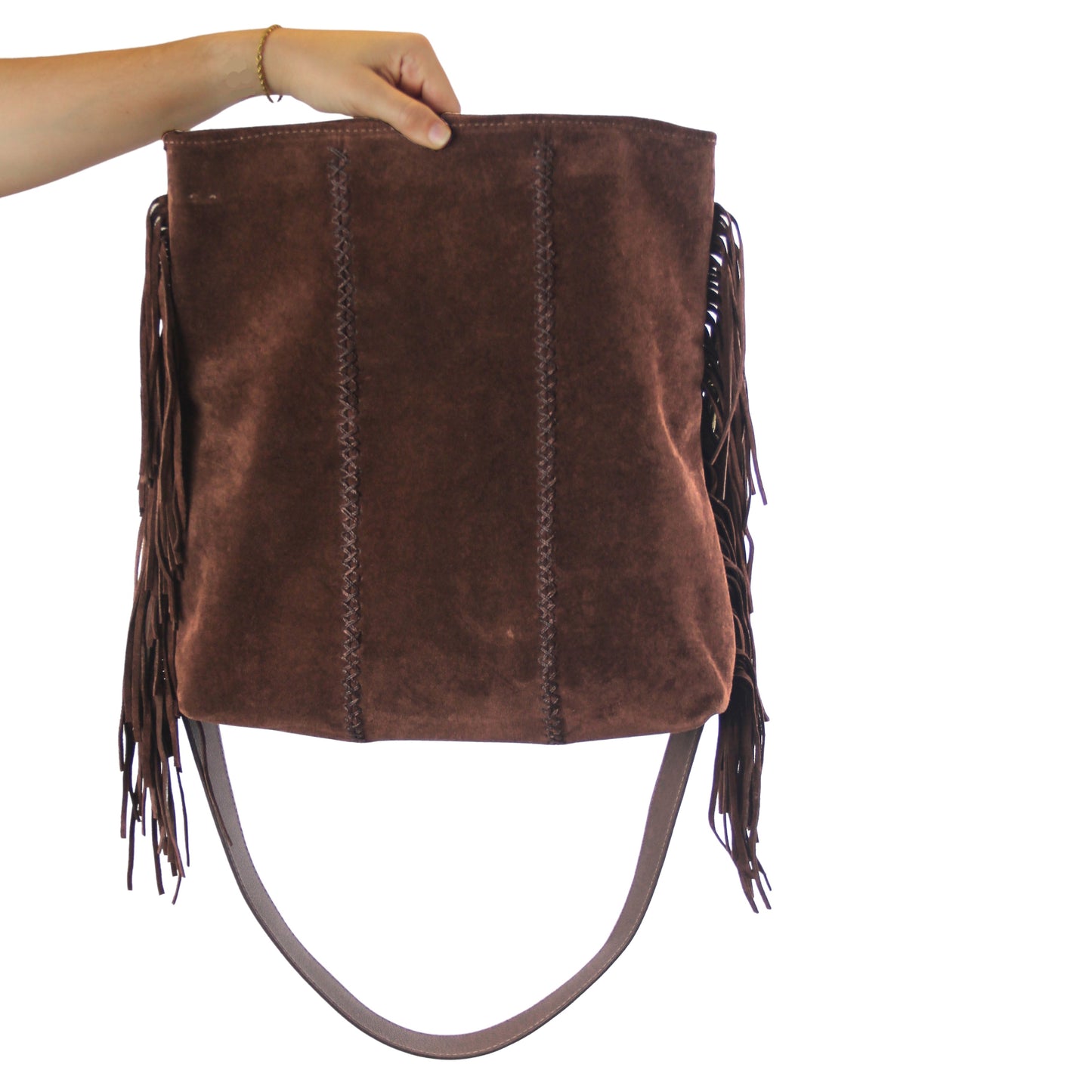 Close-up of the large fringe leather crossbody strap with intricate tassel detailing and silver-tone buckle at the front