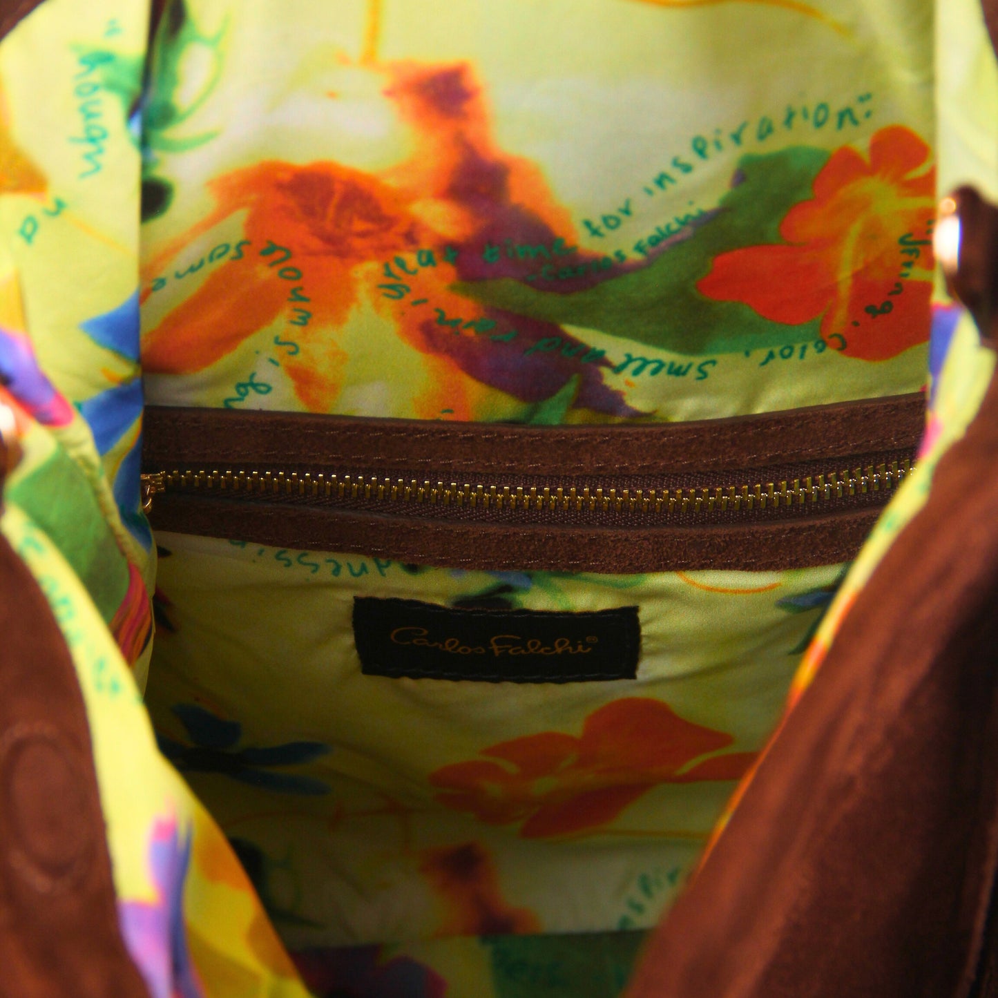 Close-up of the Large Fringe Crossbody Messenger’s textured metallic chain strap featuring antique brass plating and