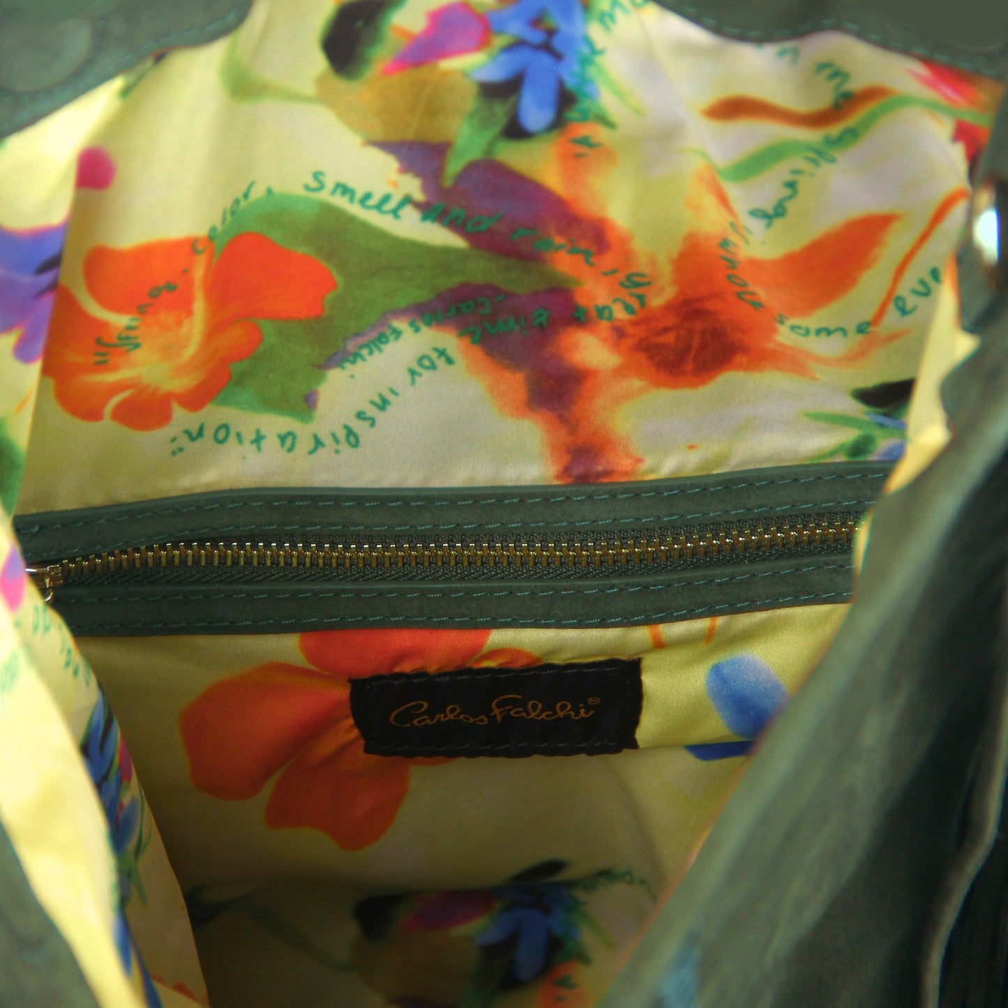 Close-up of the large fringe details with silver-tone chain links and adjustable clasp showcasing intricate metalwork from a