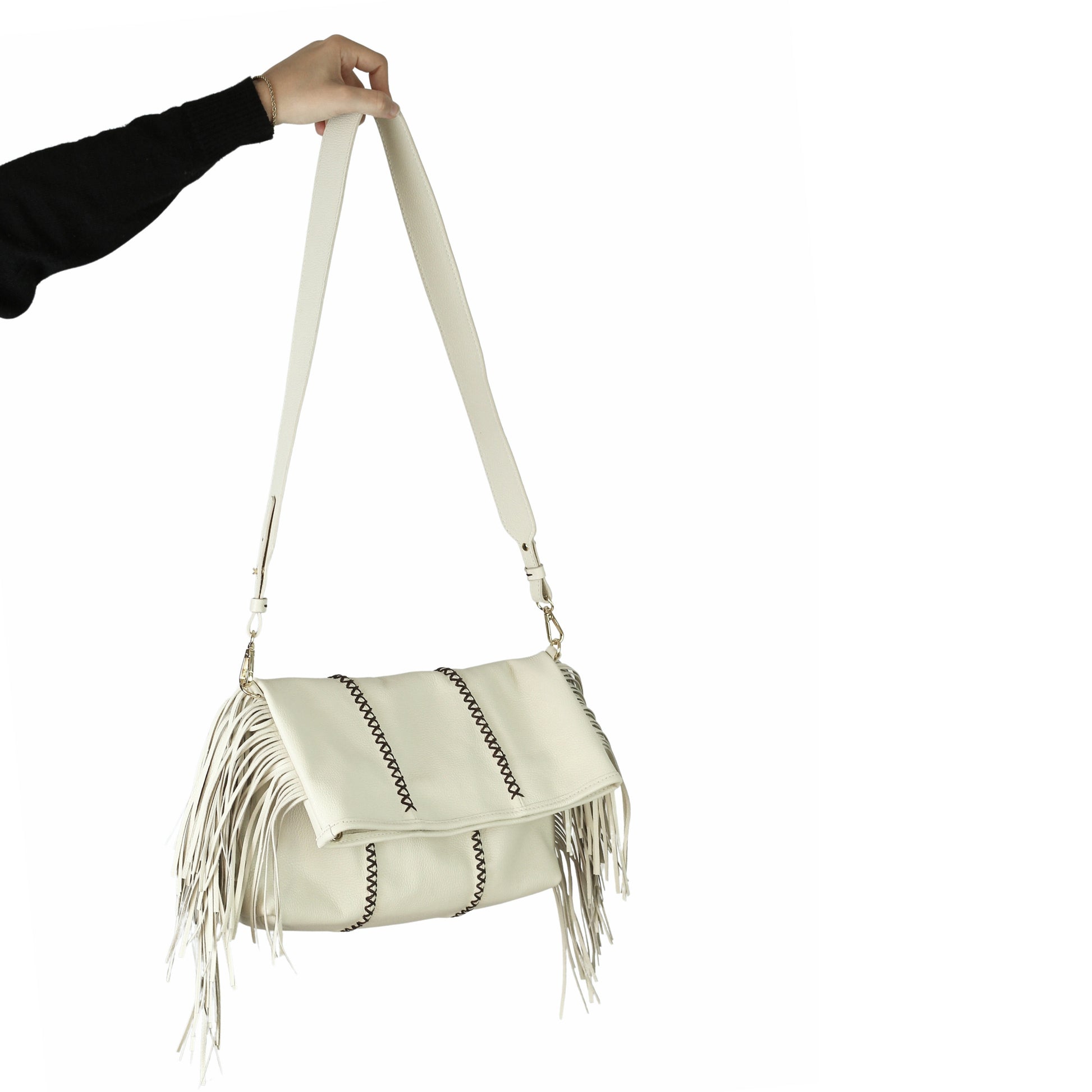 Close-up of the large fringe leather crossbody strap with detailed stitching and silver-tone chain hardware at the