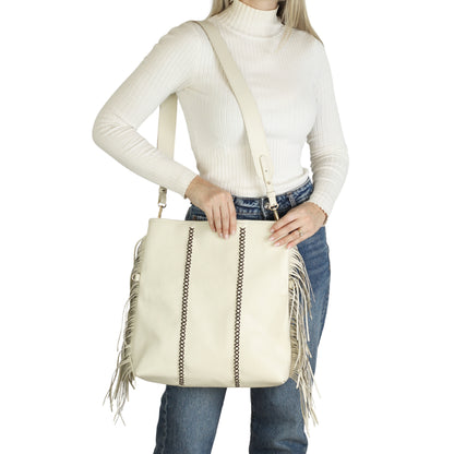 Close-up of the Large Fringe Crossbody Messenger’s textured metal clasp with intricate detailing and layered fringe accents.