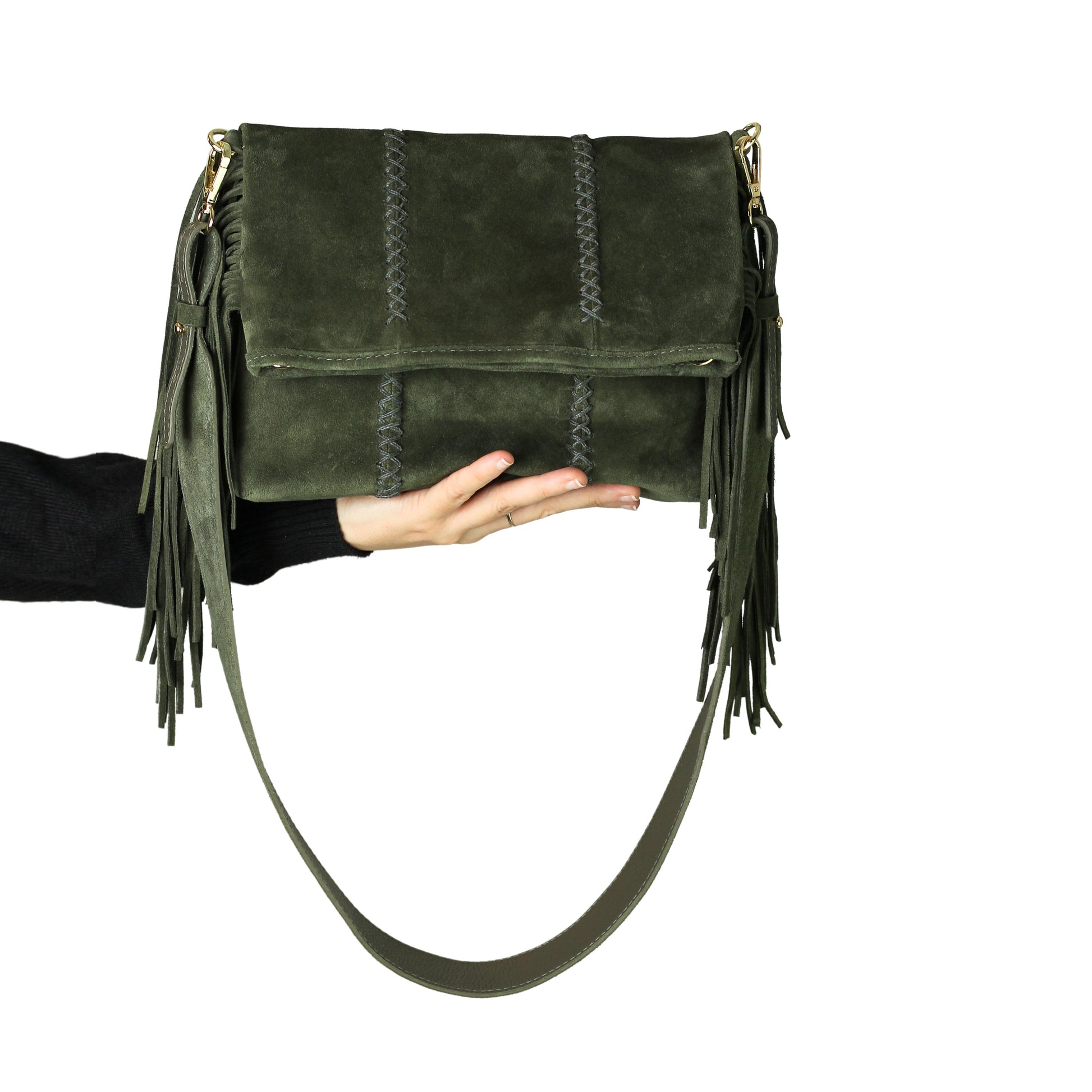 Close-up of the Fringe Crossbody Messenger’s gold-tone chain strap showing textured links and lobster clasp detail from a