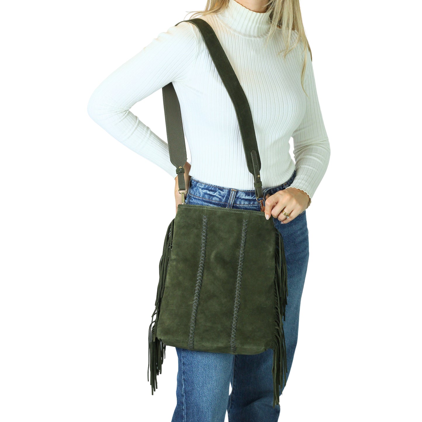 Close-up of the Fringe Crossbody Messenger’s textured leather strap with detailed stitching and silver-toned metal hardware