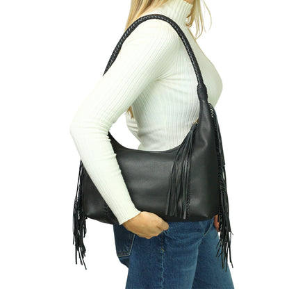 Close-up of the Fringe Hobo Bag’s textured leather surface with visible stitching and subtle fringe detailing at the corner.