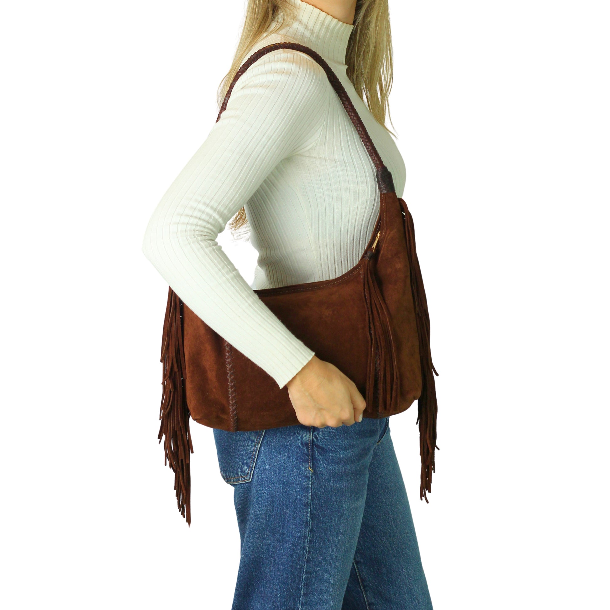 Close-up of the Fringe Hobo Bag’s textured leather surface with intricate stitching and frayed edge detailing from a front