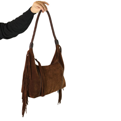 Close-up of the Fringe Hobo Bag’s textured leather surface highlighting intricate fringe stitching and distressed finish