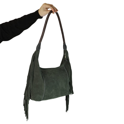 Close-up of the fringed leather surface highlighting intricate stitch details and textured tassel accents on the Fringe Hobo