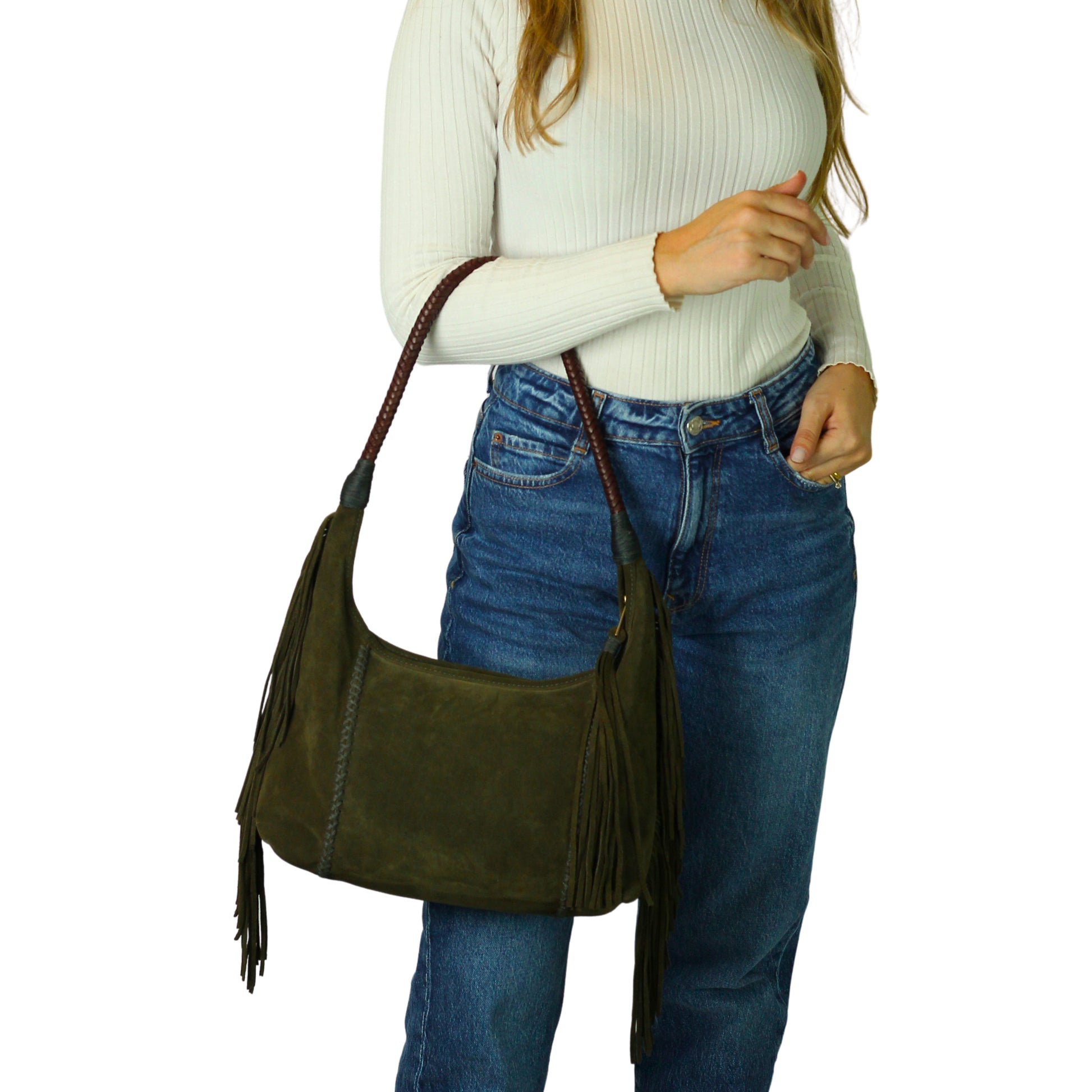 Close-up of the fringed leather tassel detail and chain attachment showcasing craftsmanship and texture.