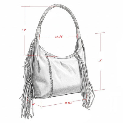 Close-up of the Fringe Hobo Bag's textured leather strap with detailed metal rivets and subtle fringe accents at the top
