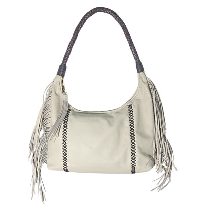 Close-up of the Fringe Hobo Bag’s textured leather surface showcasing the detailed fringe stitching and rustic metal tassel
