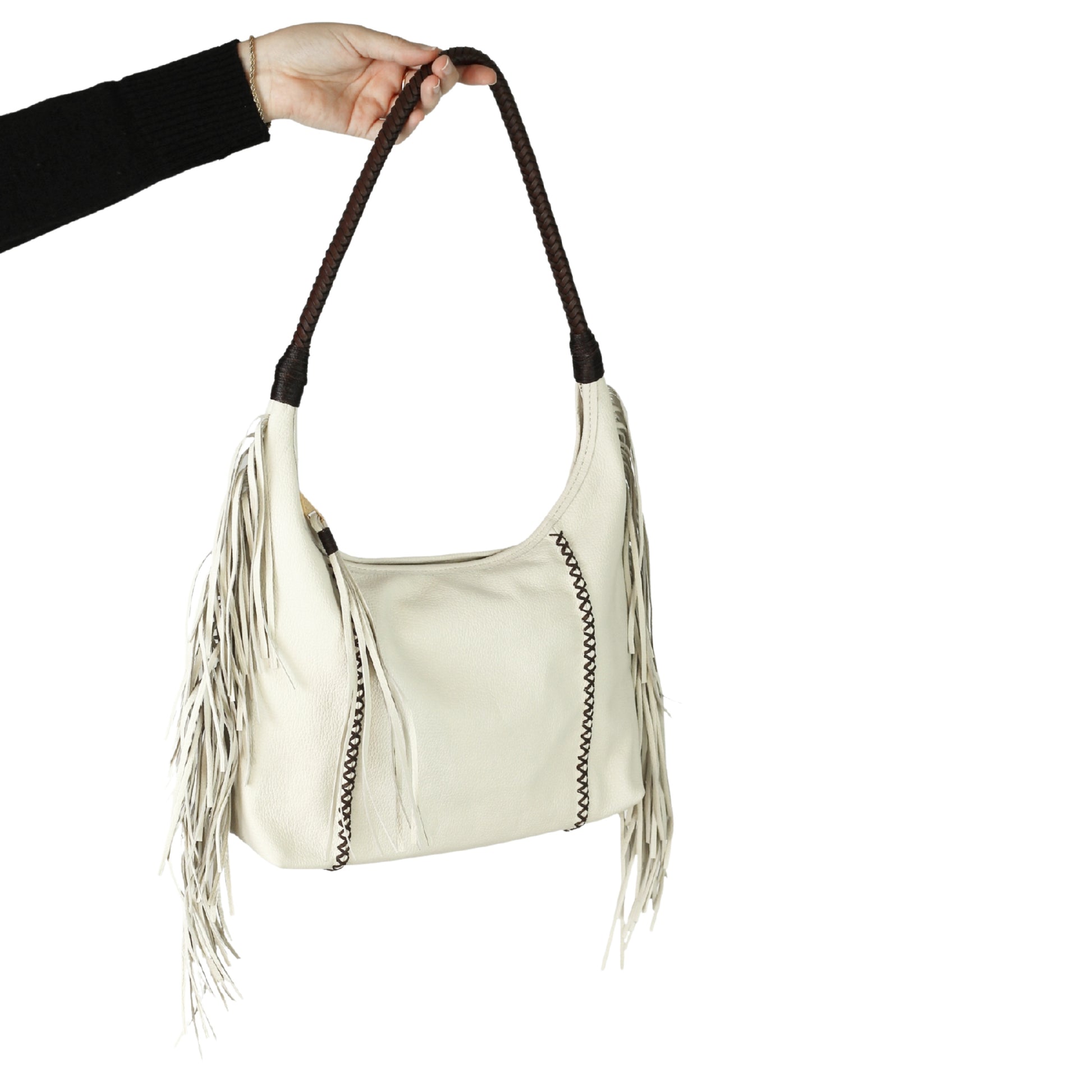 Close-up of the fringed leather surface highlighting textured details and hand-stitched craftsmanship of the Fringe Hobo Bag.