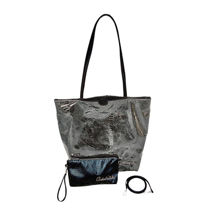 Close-up of textured vegan Python Tote's durable woven handle with subtle natural color variations and reinforced stitching.